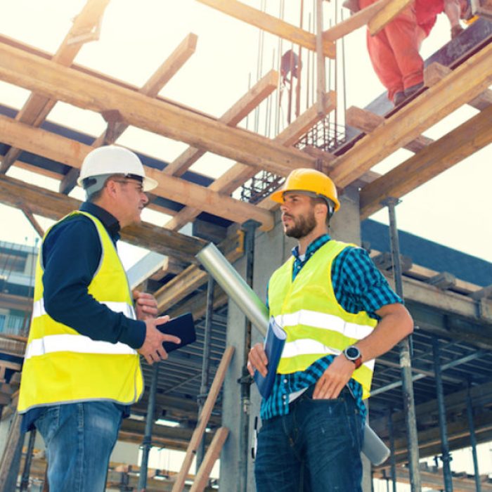 Engineers having meeting regarding new construction phase
